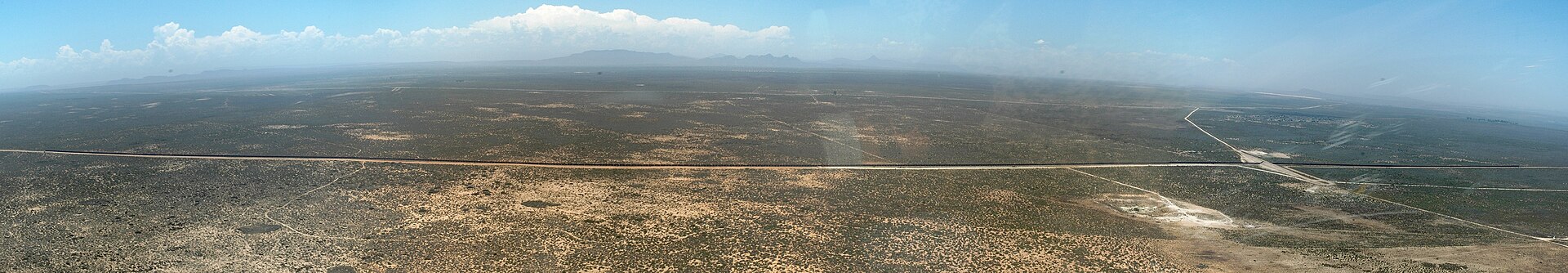 An iron ore train on the Sishen–Saldanha line, seen from the air.